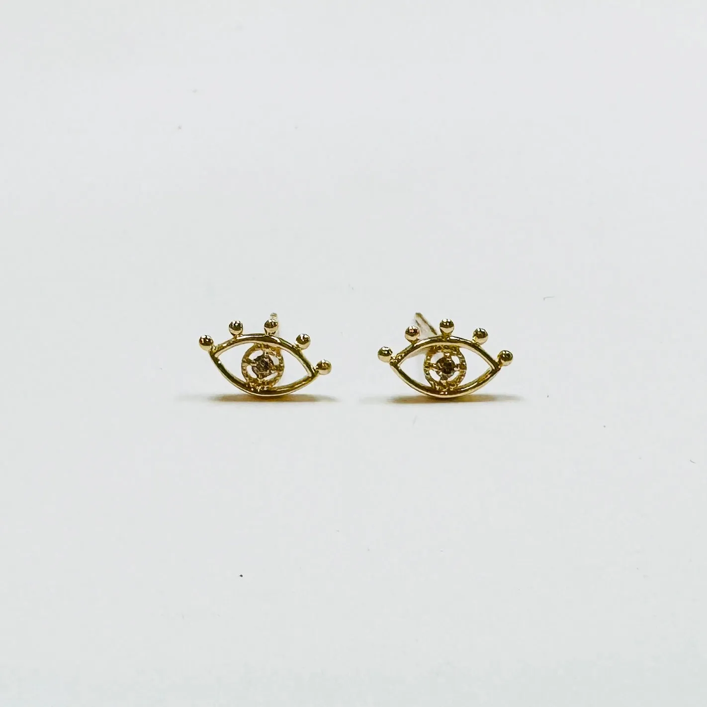 evil eye studs sold by Theodosia