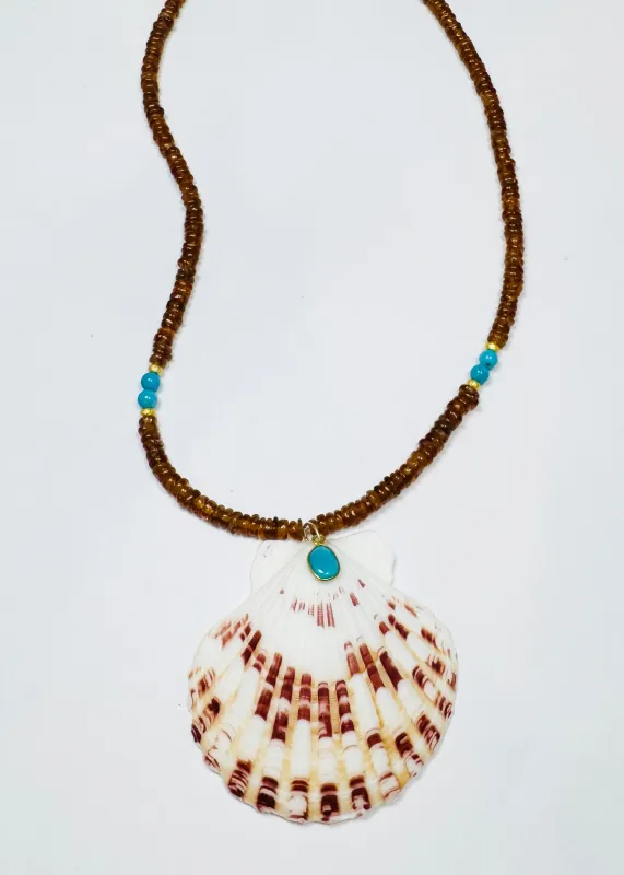 Hessonite garnet necklace with chrysoprase shell pendant sold by Theodosia