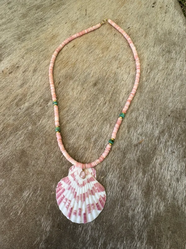 conch and turquoise necklace with shell pendant sold by Theodosia