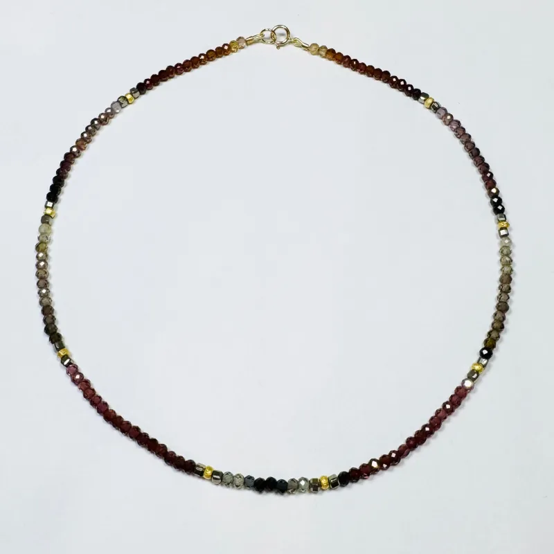 spinel with pyrite and gold beads sold by Theodosia