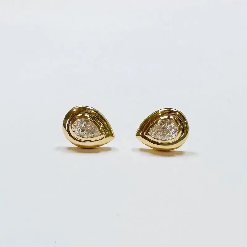 teardrop diamond stepped bezel studs sold by Theodosia