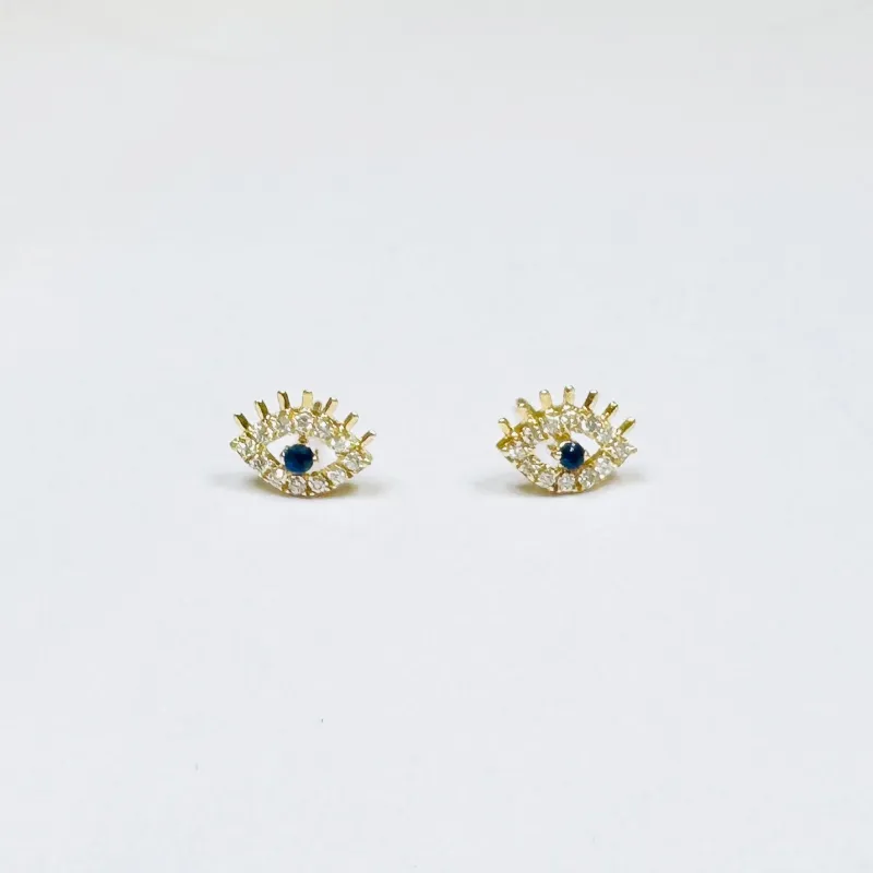 sapphire evil eye lash studs sold by Theodosia
