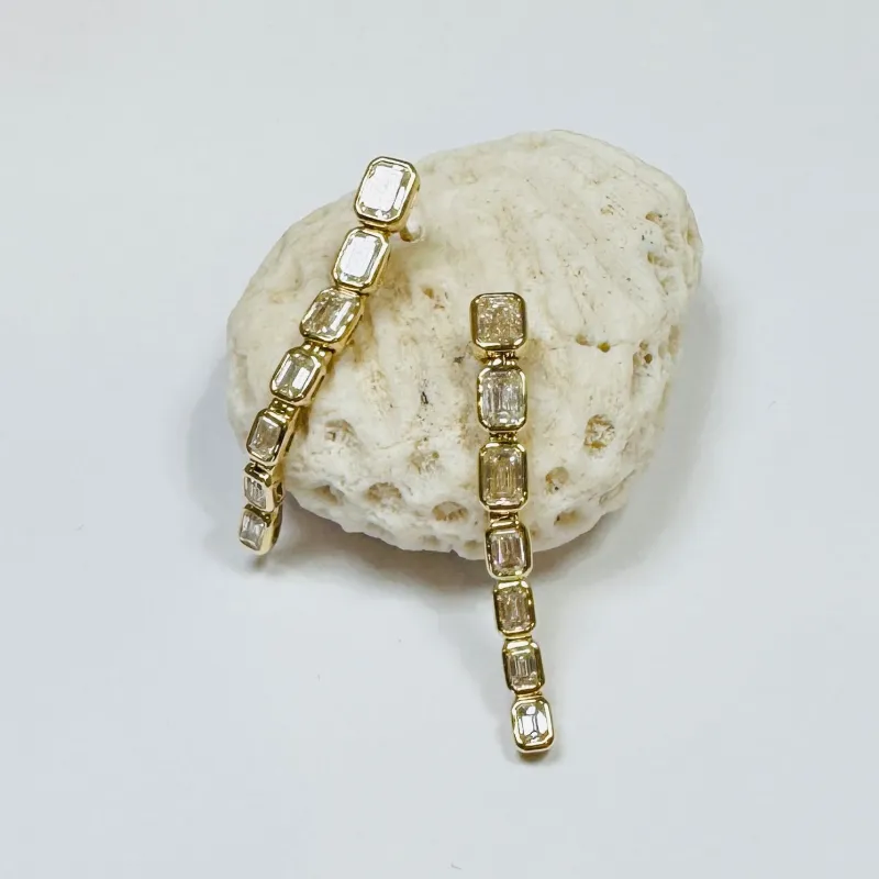 emerald cut diamond dangle sold by Theodosia