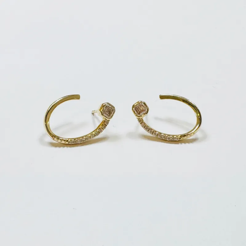 front to back spiral cushion cut diamond ear cuff sold by Theodosia