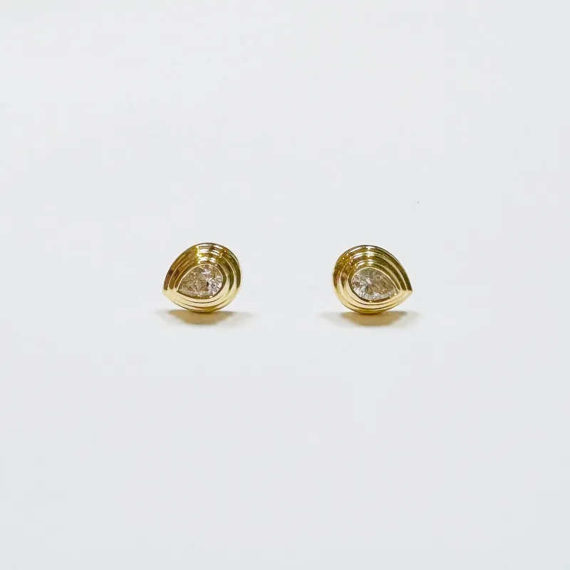 diamond stepped bezel studs sold by Theodosia