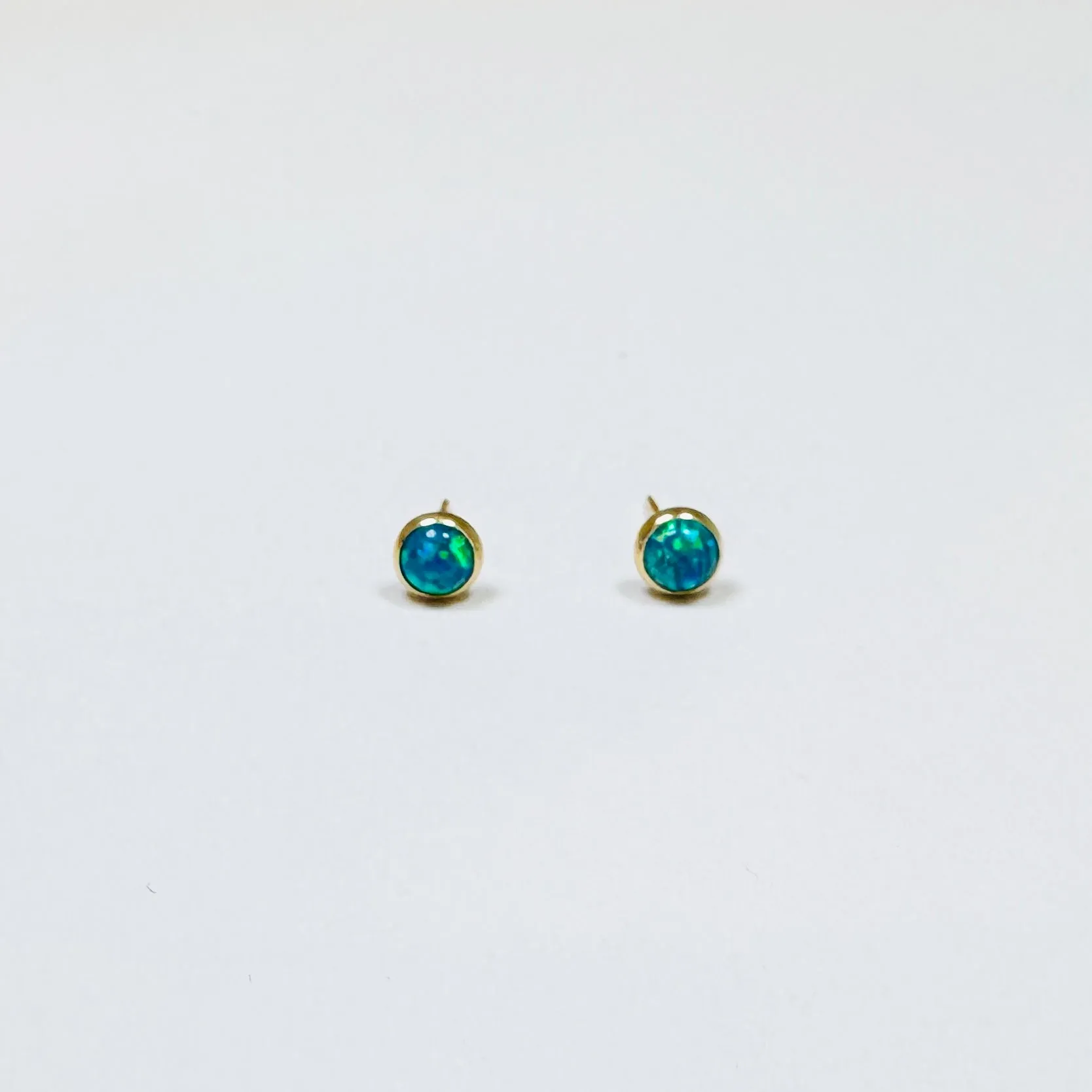 bezel opal studs sold by Theodosia
