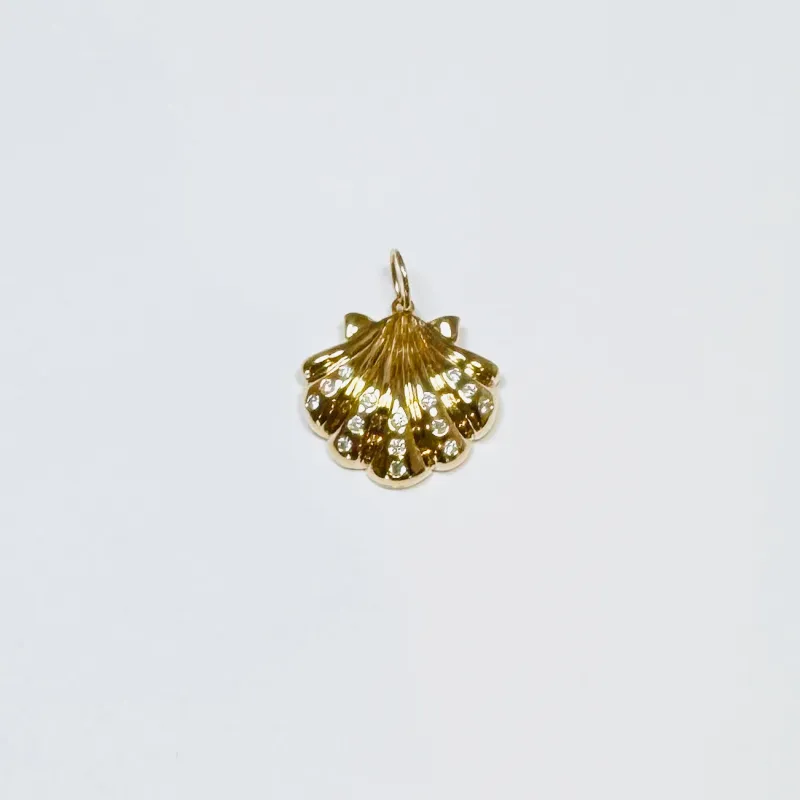 puffy gold shell pendant sold by Theodosia