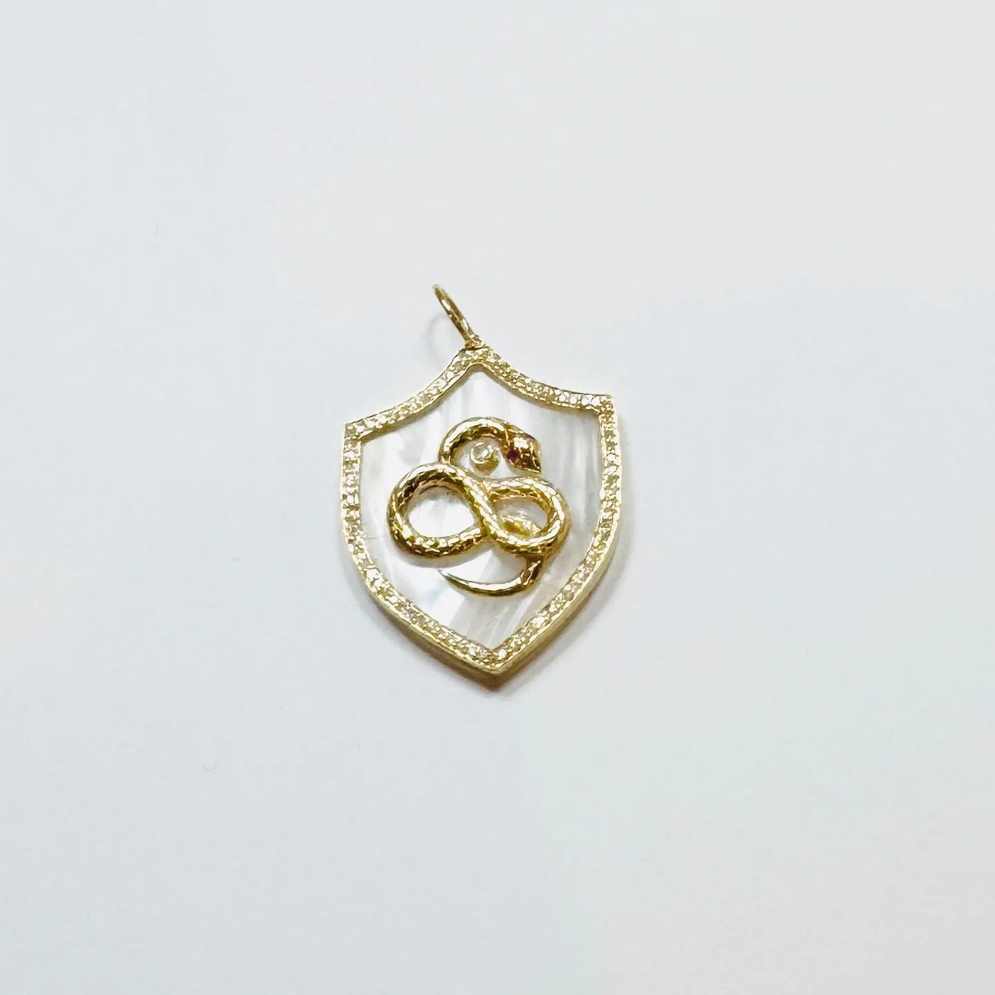 snake shield pendant sold by Theodosia