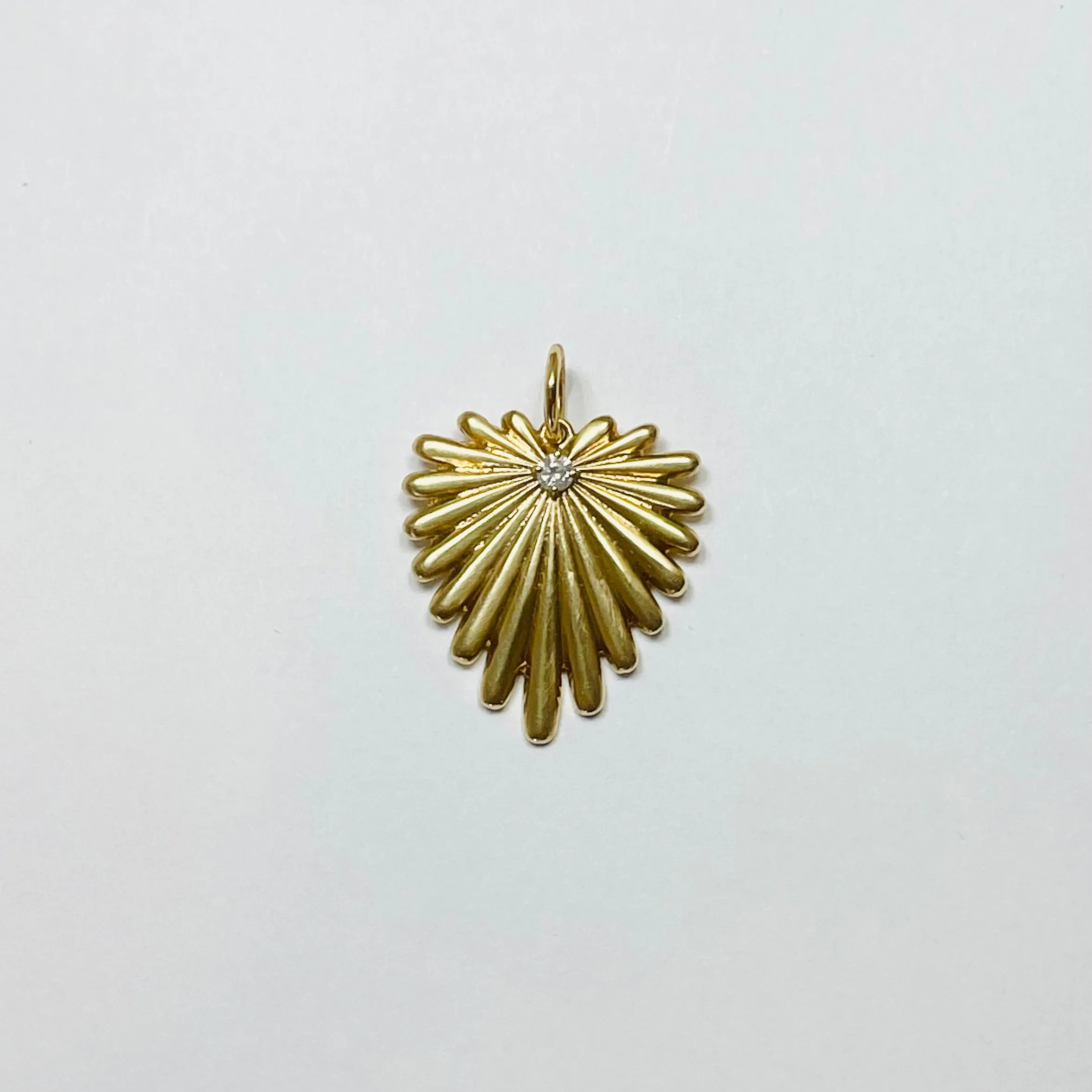 feather heart pendant sold by Theodosia