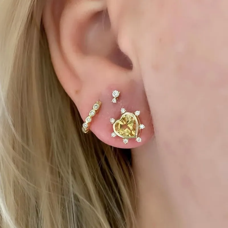 double diamond prong studs sold by Theodosia