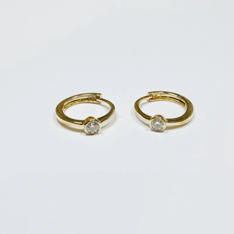 single bezel diamond huggies sold by Theodosia