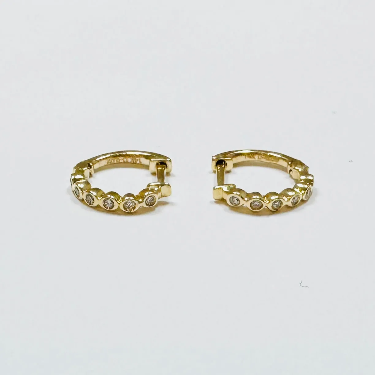 bezel diamond huggies, 12 mm sold by Theodosia