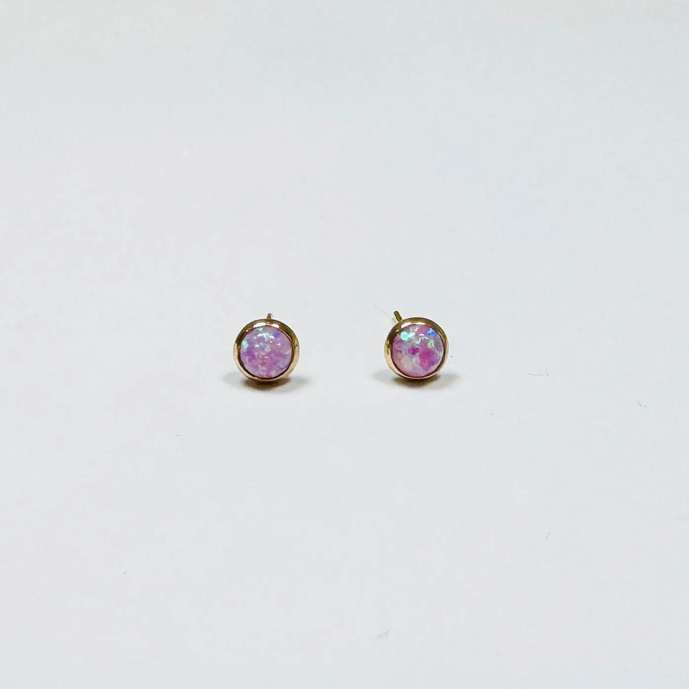 bezel pink opal studs sold by Theodosia