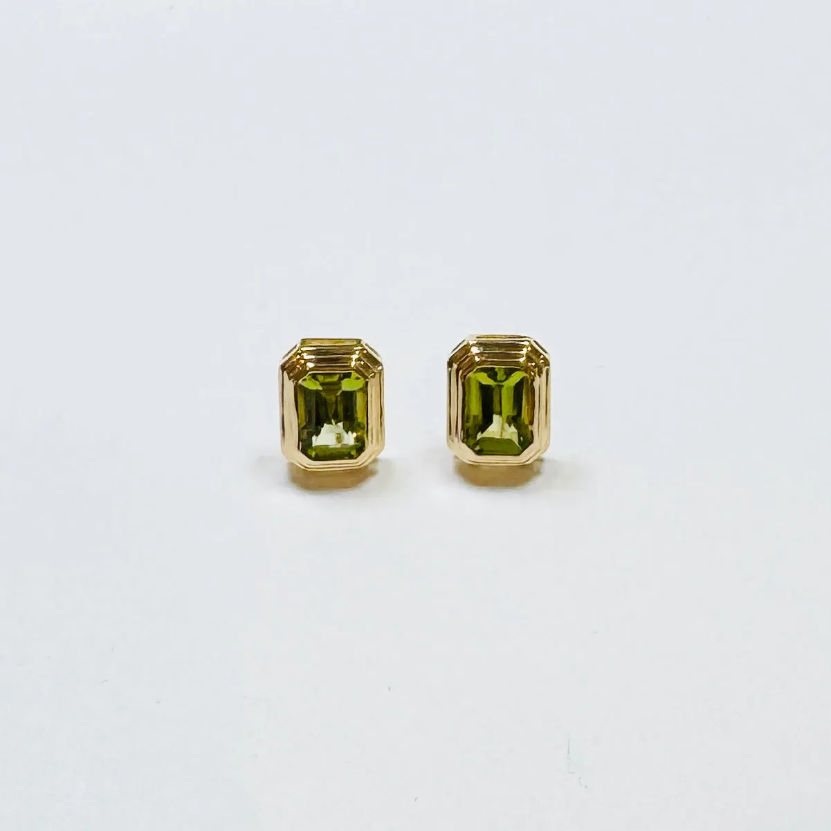 peridot stepped bezel studs sold by Theodosia