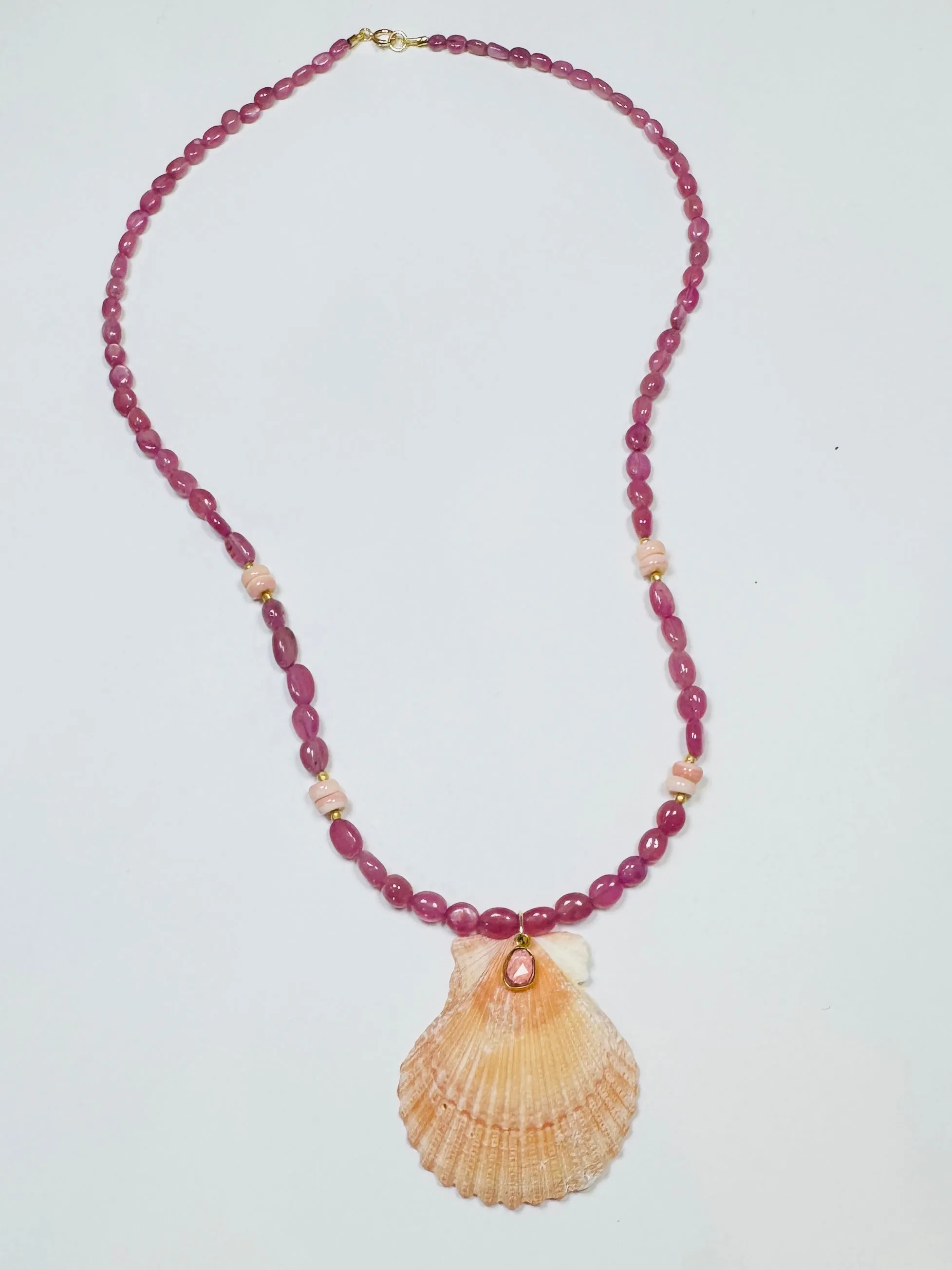 pink sapphire necklace with shell pendant sold by Theodosia
