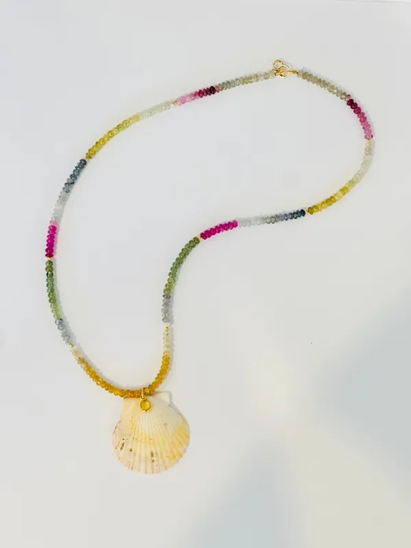 rainbow sapphire necklace with shell pendant sold by Theodosia