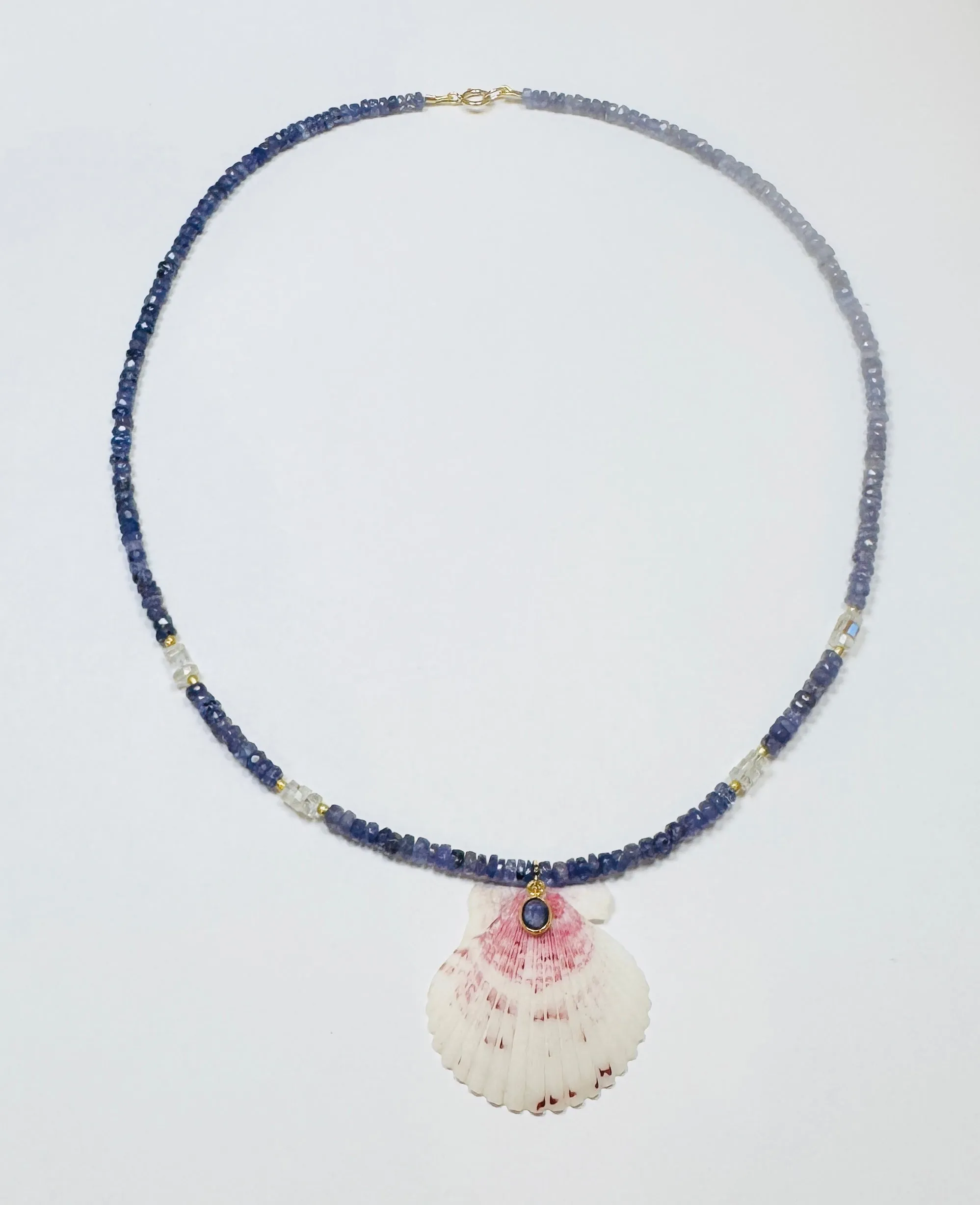tanzanite necklace with shell pendant sold by Theodosia