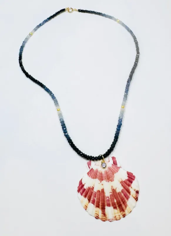 shaded blue sapphire necklace with shell pendant sold by Theodosia