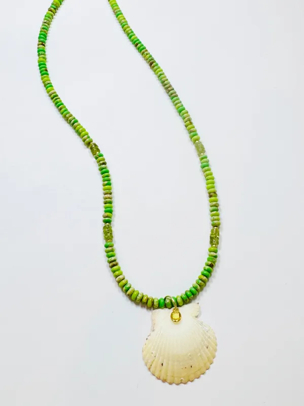 green turquoise and peridot necklace with shell pendant sold by Theodosia