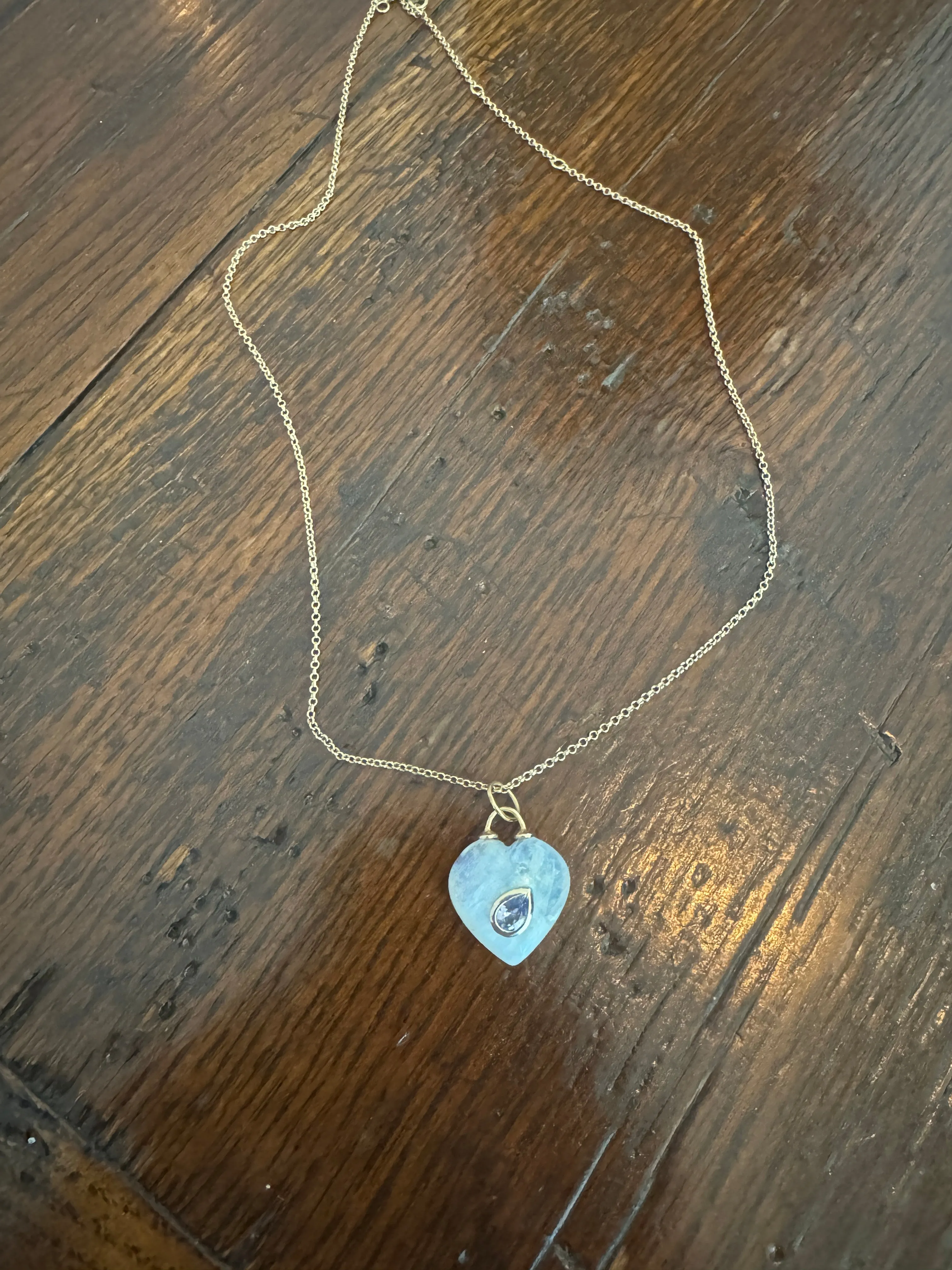 puffy moonstone heart on chain sold by Theodosia