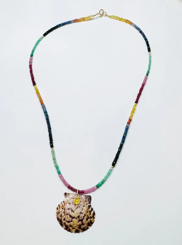 CN faceted rainbow sapphire necklace with shell pendant sold by Theodosia