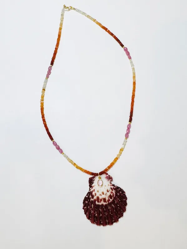 fire opal and pink sapphire necklace with shell pendant sold by Theodosia