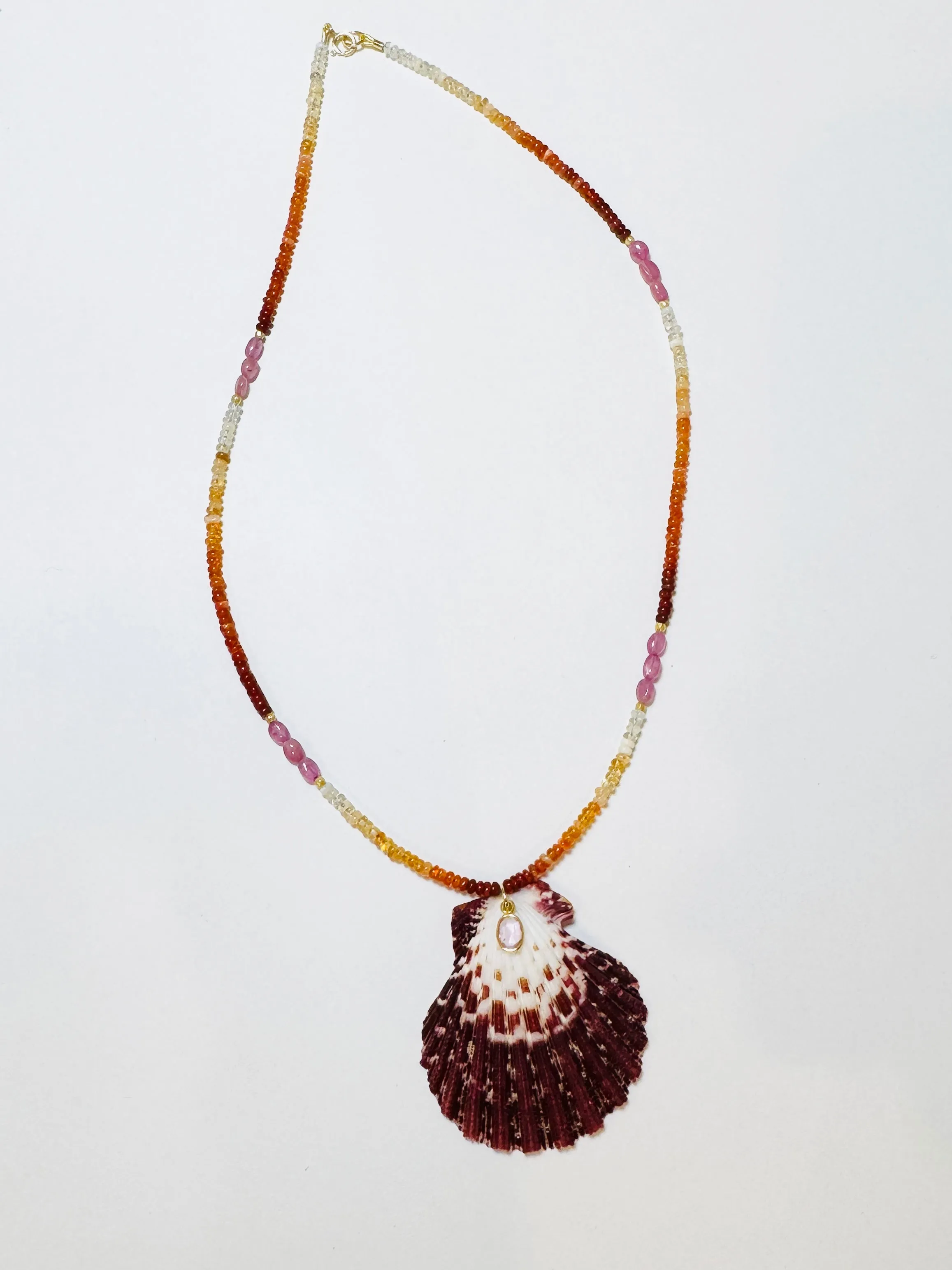 fire opal and pink sapphire necklace with shell pendant sold by Theodosia