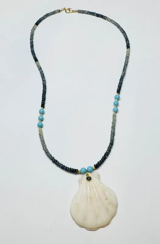 shaded blue sapphire and turquoise necklace with strawberry shell pendant sold by Theodosia