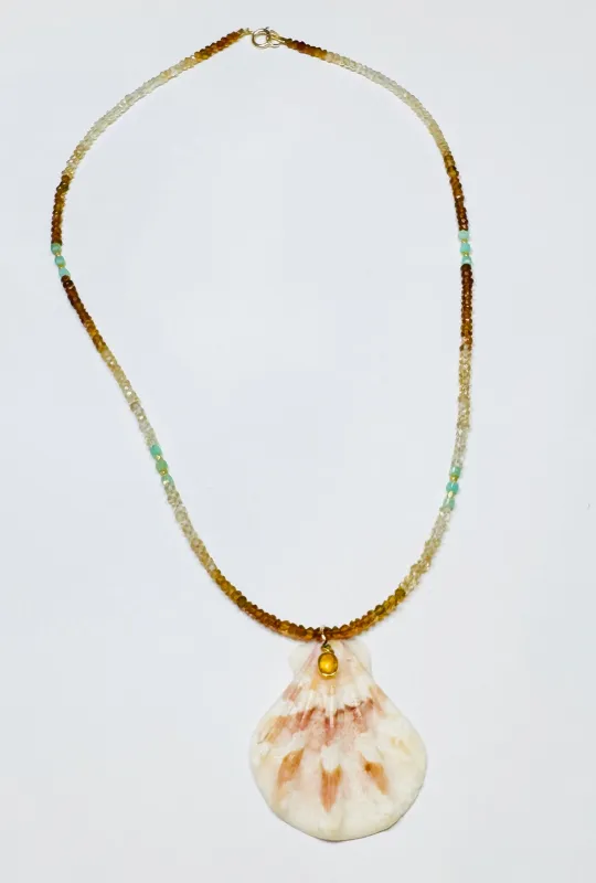 shaded sapphire and chrysoprase cube necklace with strawberry shell pendant sold by Theodosia