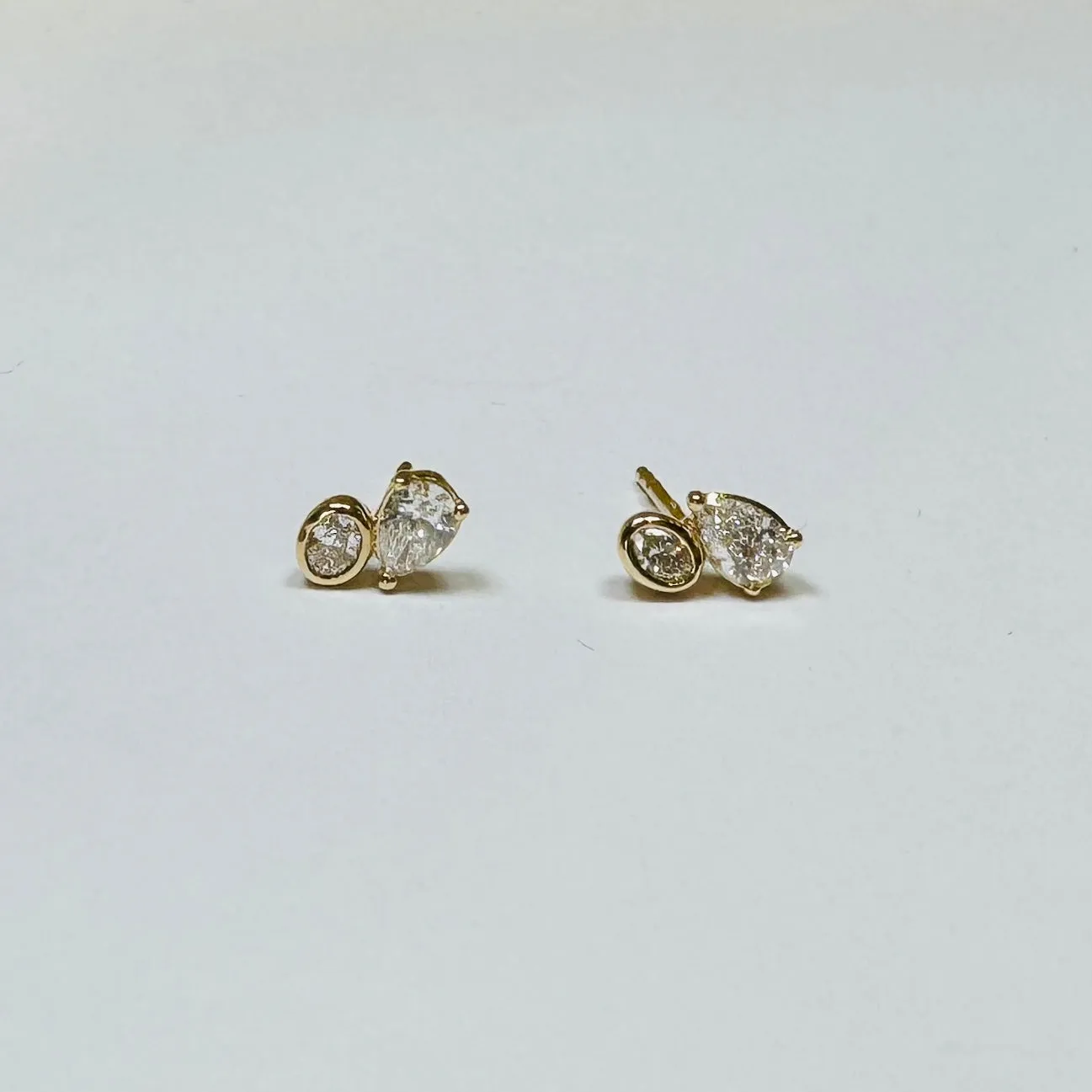 oval teardrop diamond cluster studs sold by Theodosia