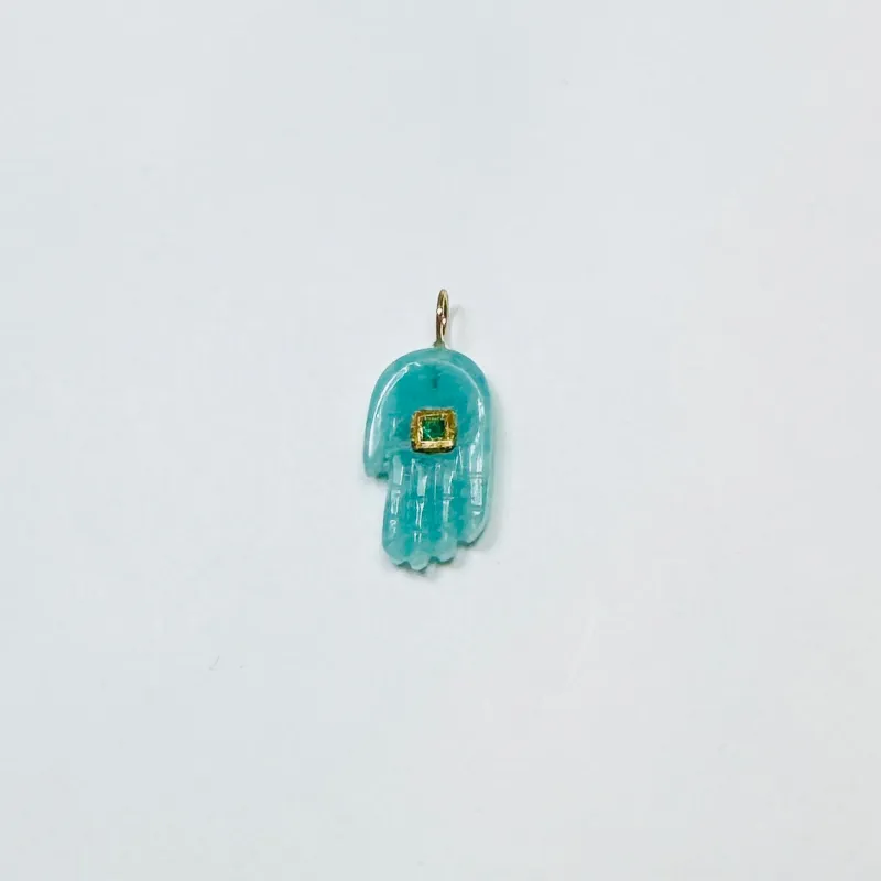 carved hamsa pendant sold by Theodosia