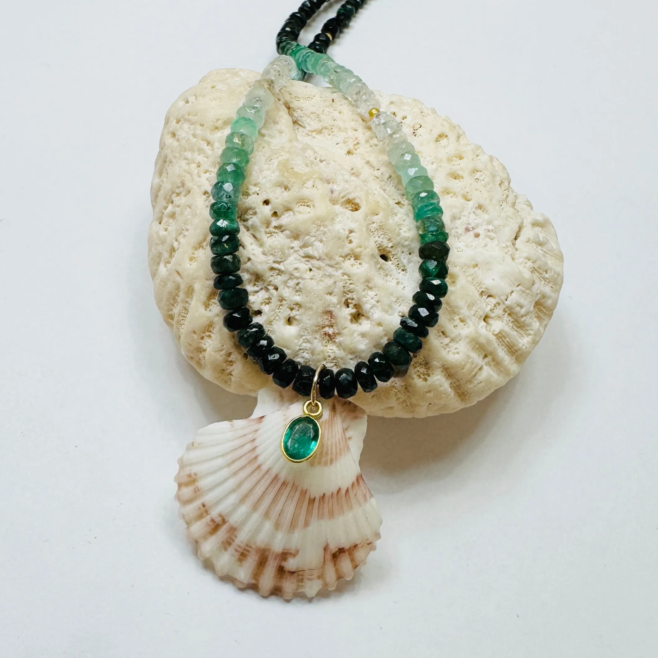 emerald necklace with shell pendant sold by Theodosia