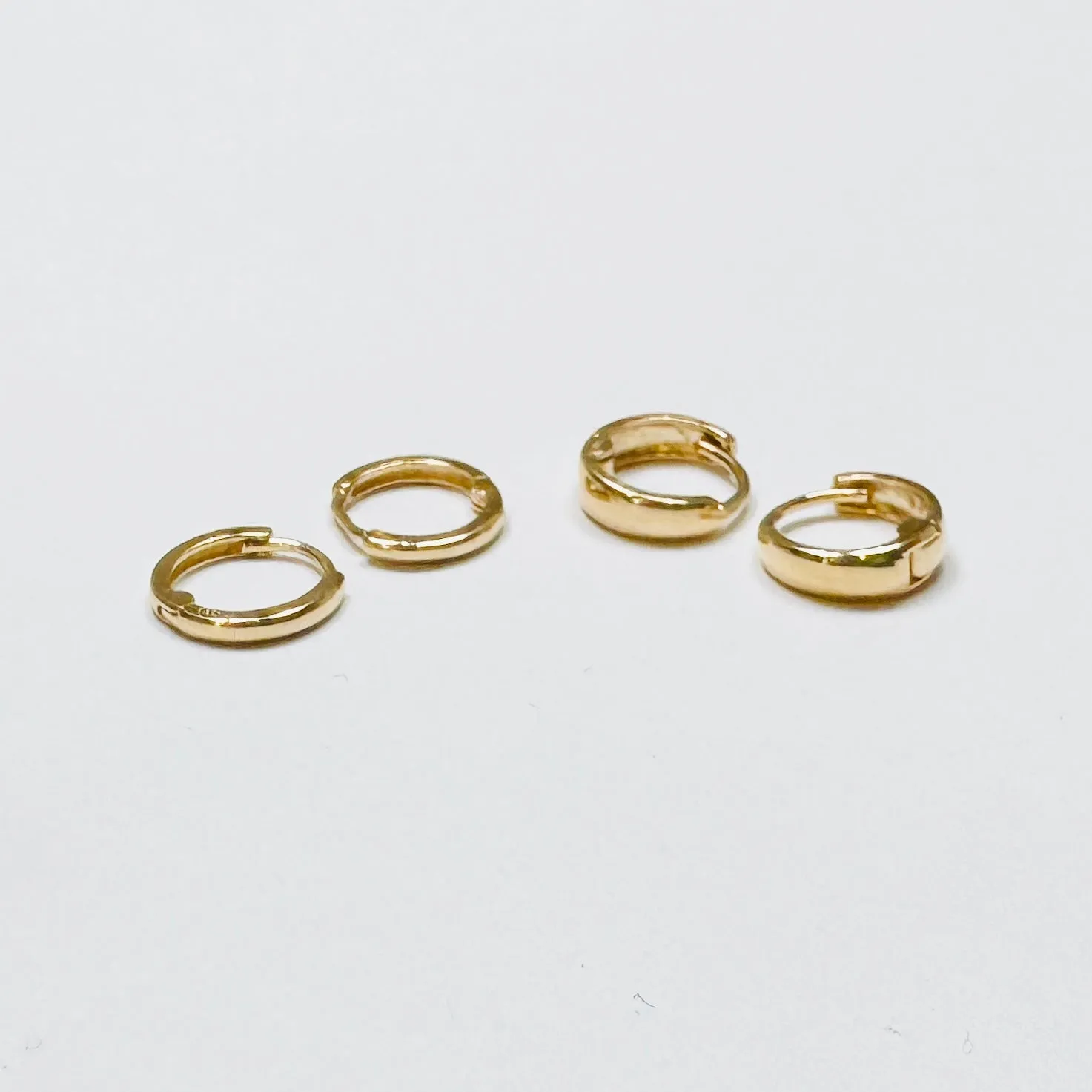 mini gold hoops sold by Theodosia