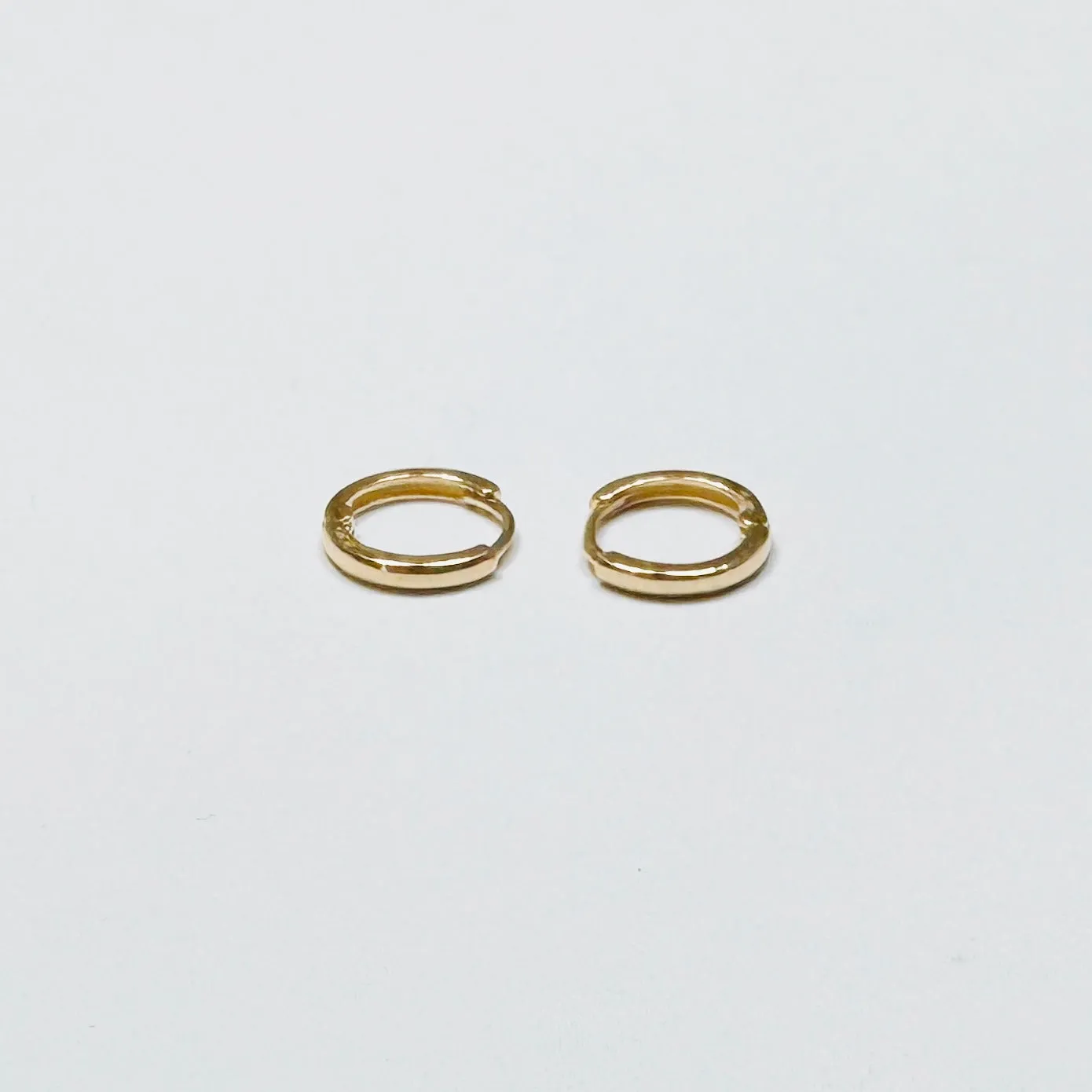 mini gold hoops sold by Theodosia product image thumbnail 3