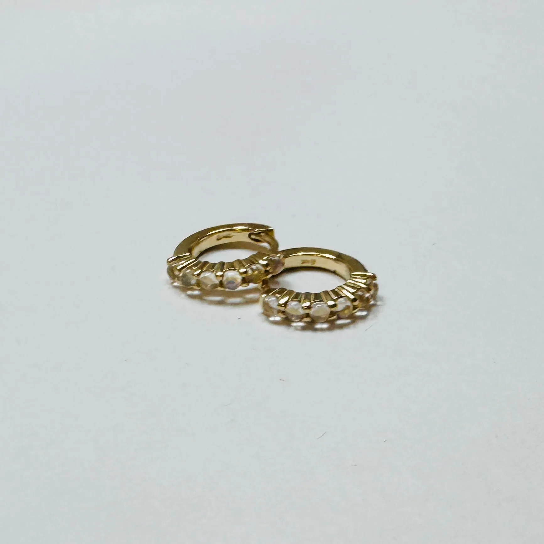 rainbow moonstone huggies sold by Theodosia