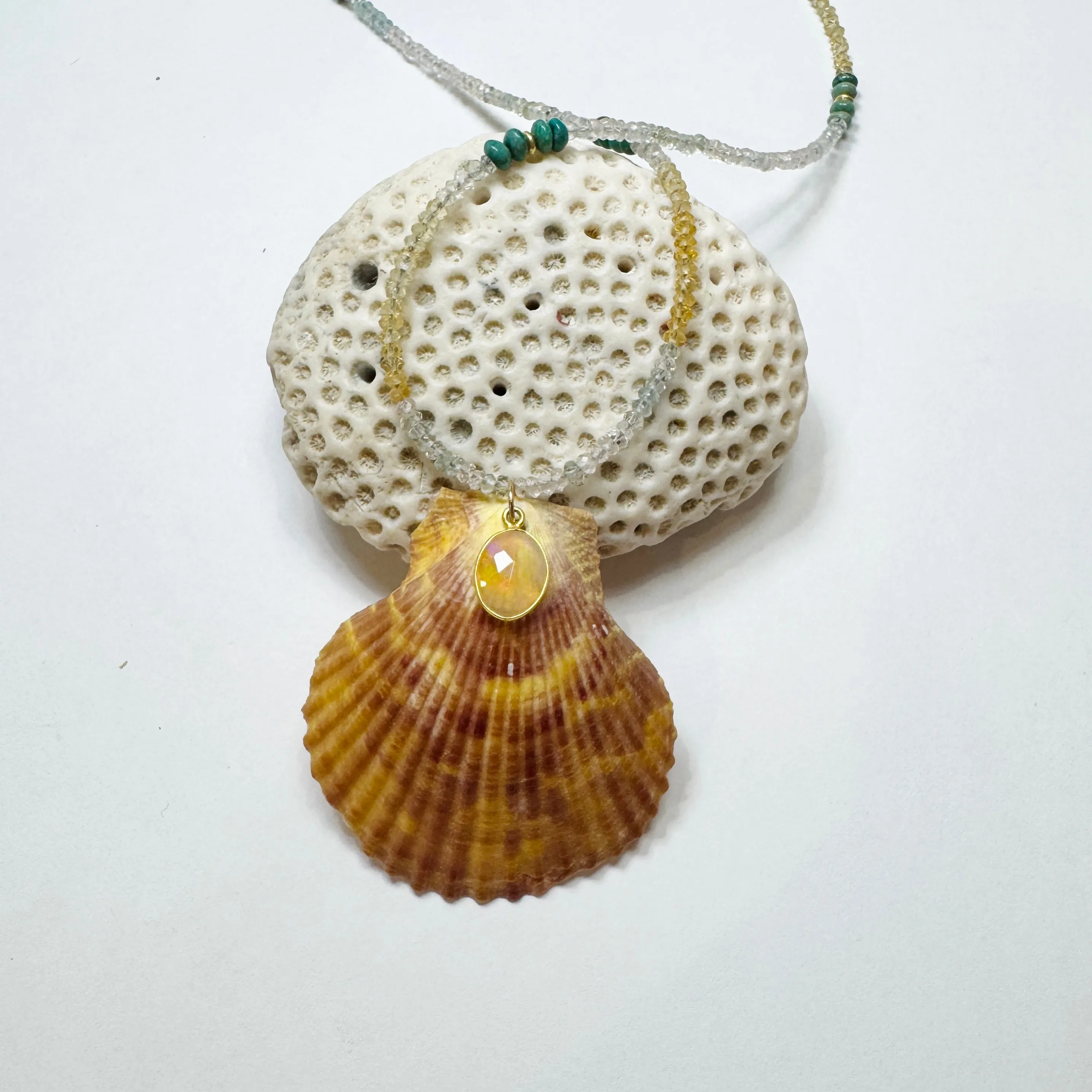 aquamarine necklace with shell pendant sold by Theodosia