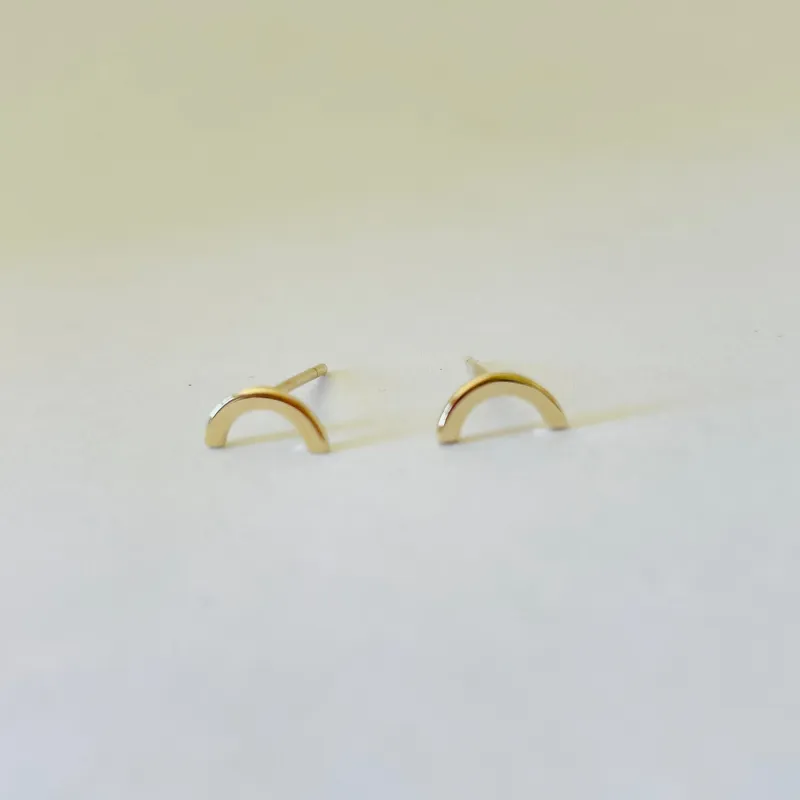 gold rainbow studs sold by Theodosia