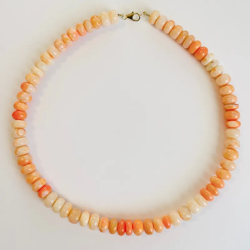 orange creamsicle opal candy necklace sold by Theodosia