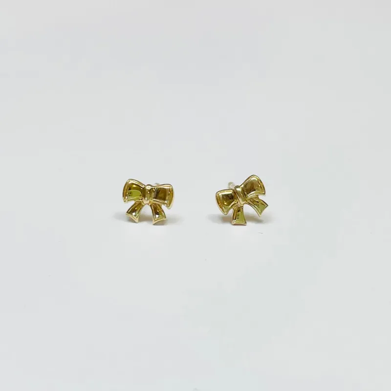 mini bow studs sold by Theodosia