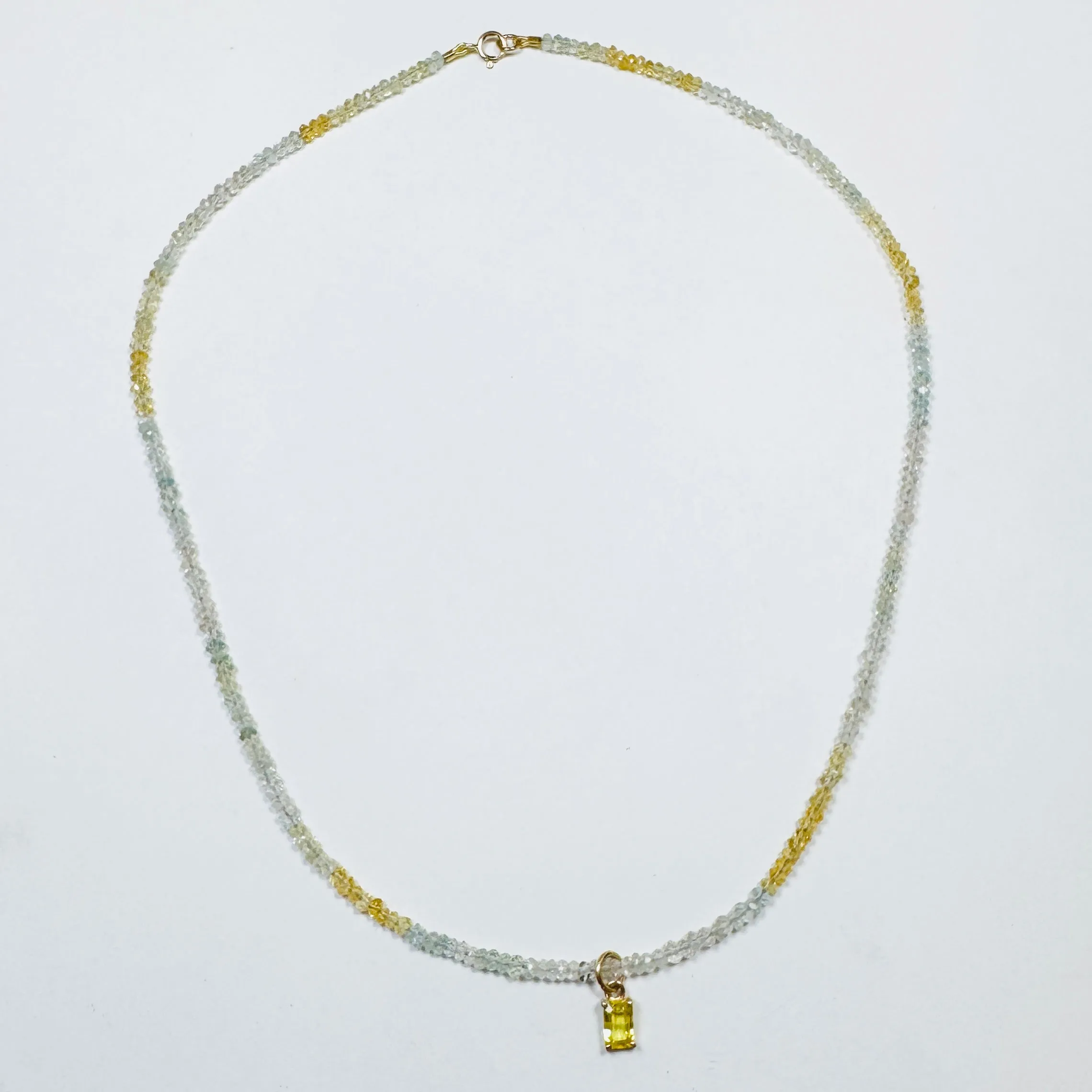 Aquamarine necklace with yellow sapphire charm sold by Theodosia