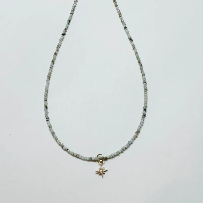 delicate Peruvian blue opal necklace with diamond starburst charm sold by Theodosia
