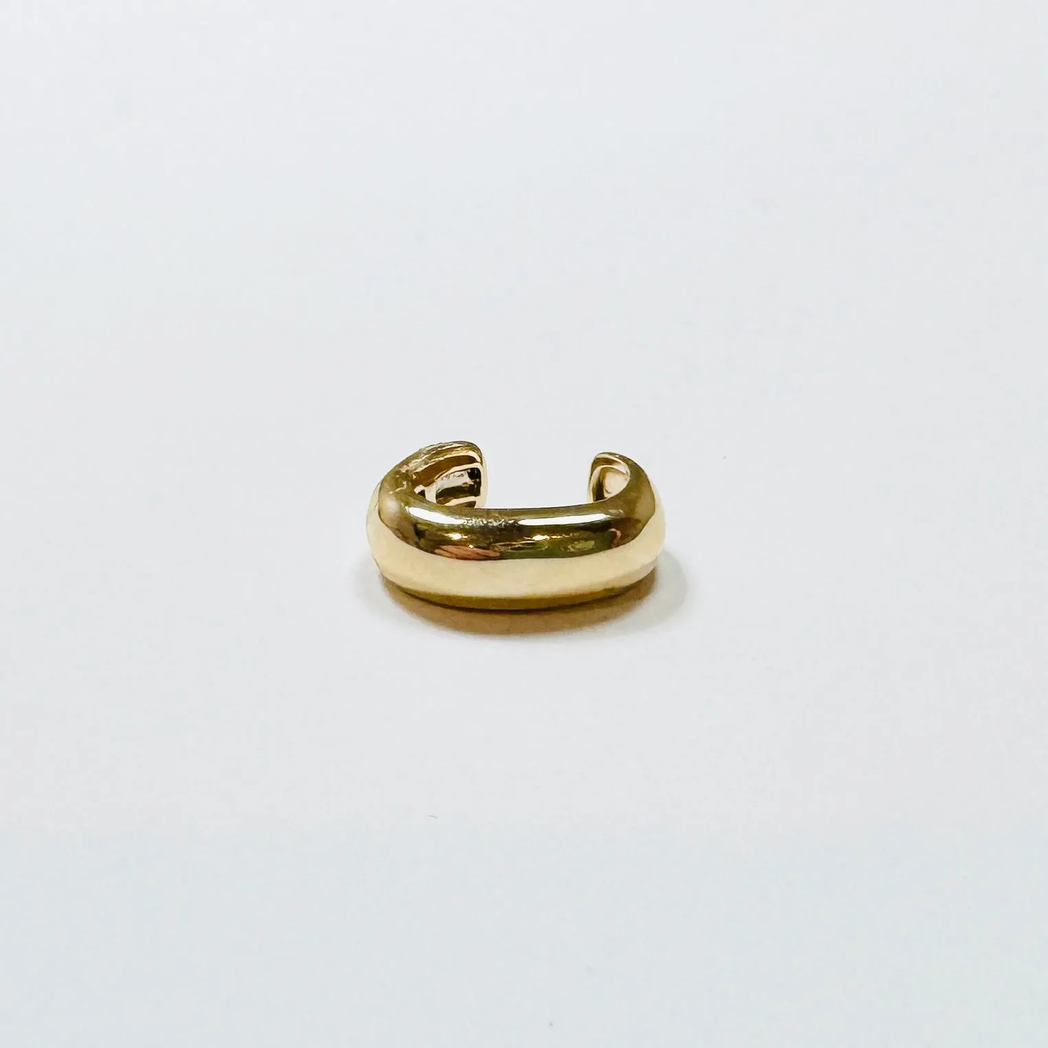 gold ear cuff sold by Theodosia