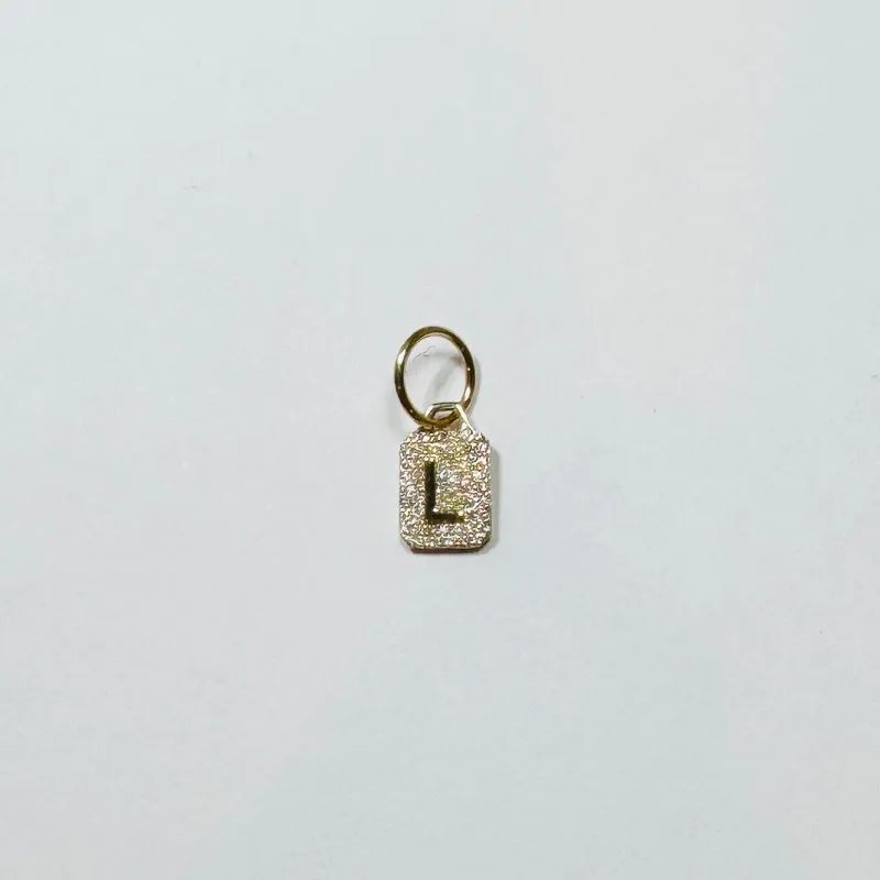 inital dog tag charm sold by Theodosia