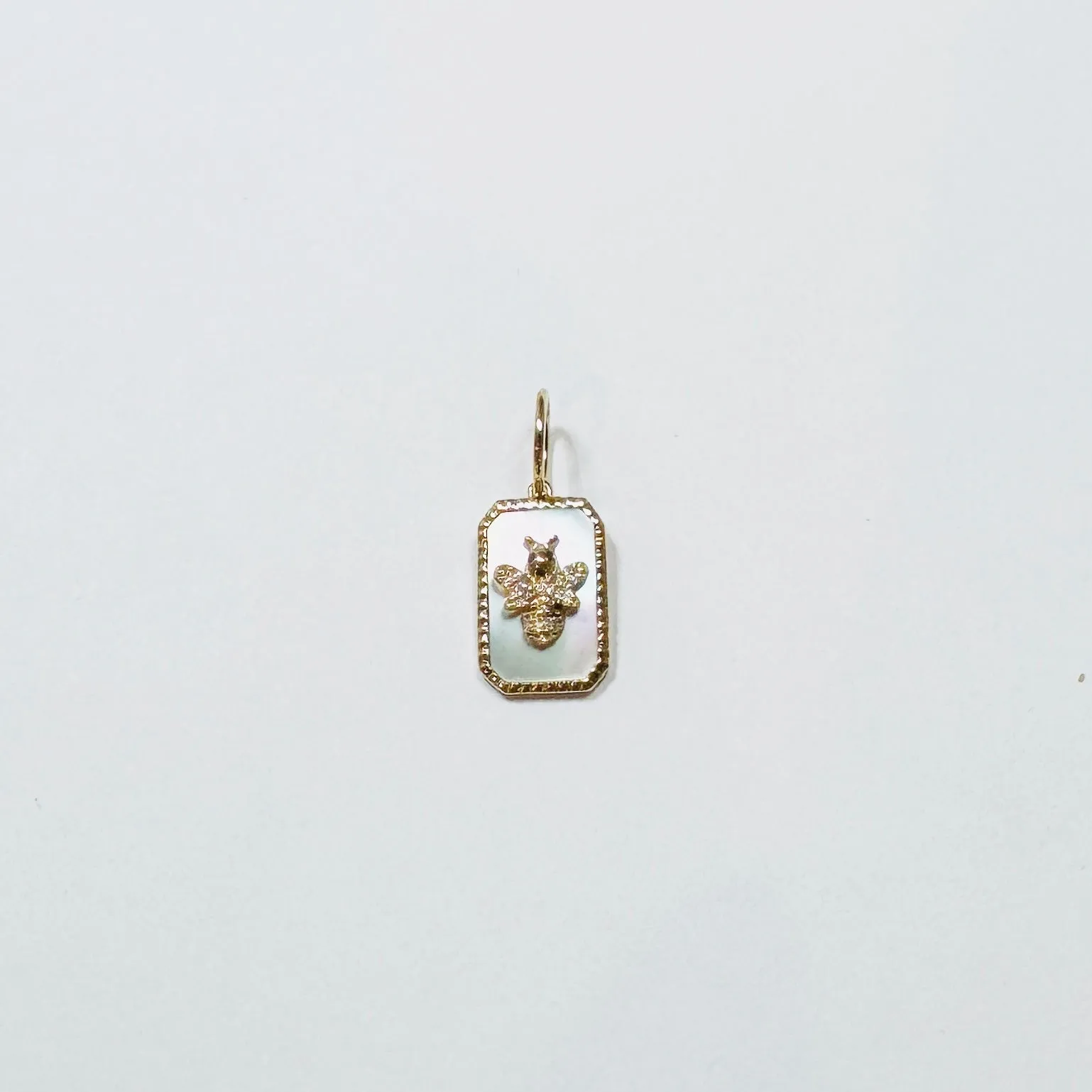 mother of pearl dog tag charm sold by Theodosia product image thumbnail 2