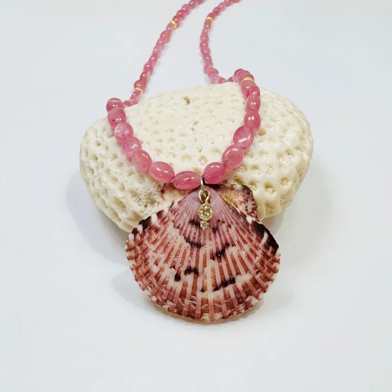 pink sapphire necklace with shell pendant sold by Theodosia