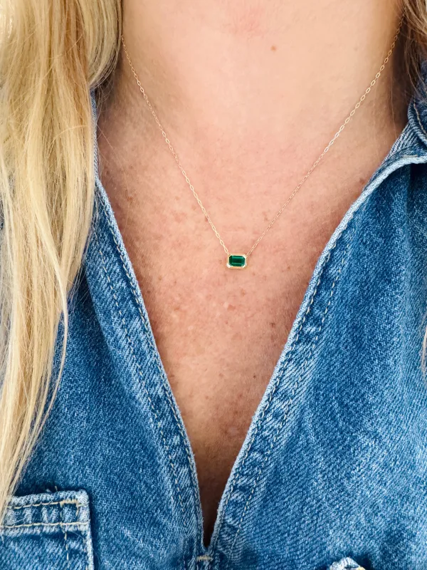 emerald bezel east west slide on curb chain sold by Theodosia