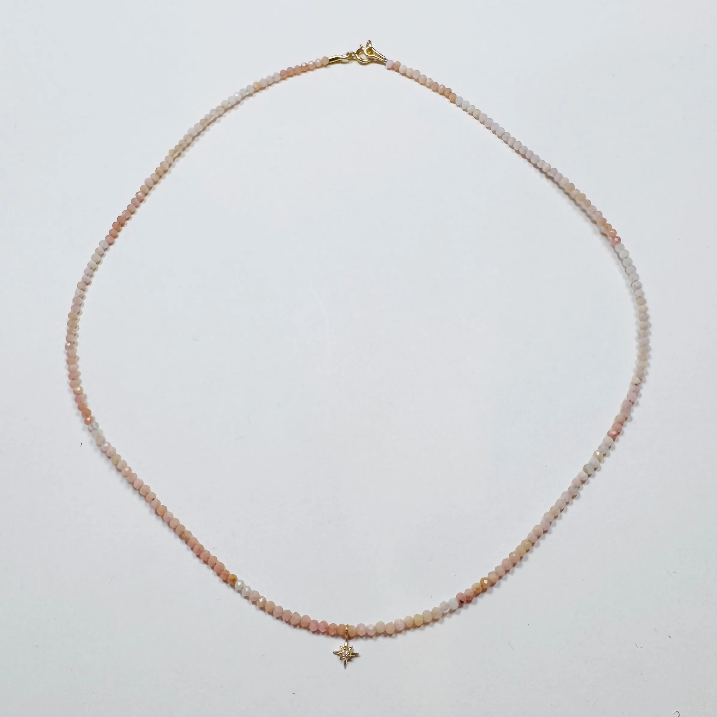 delicate turquoise necklace with diamond star charm sold by Theodosia