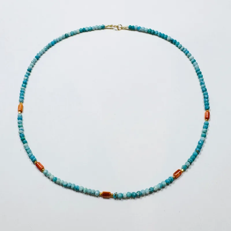 turquoise, coral, and gold beads sold by Theodosia