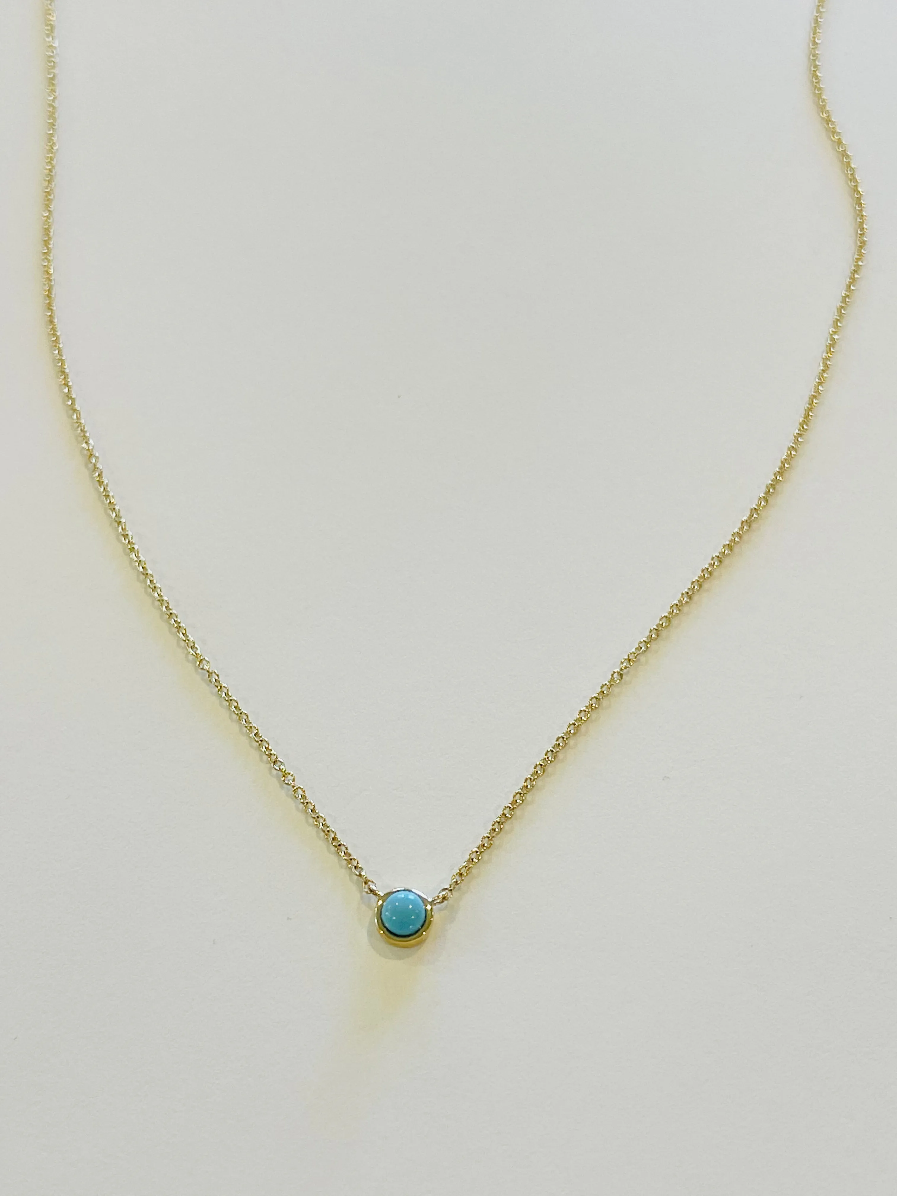 bezel set turquoise necklace sold by Theodosia