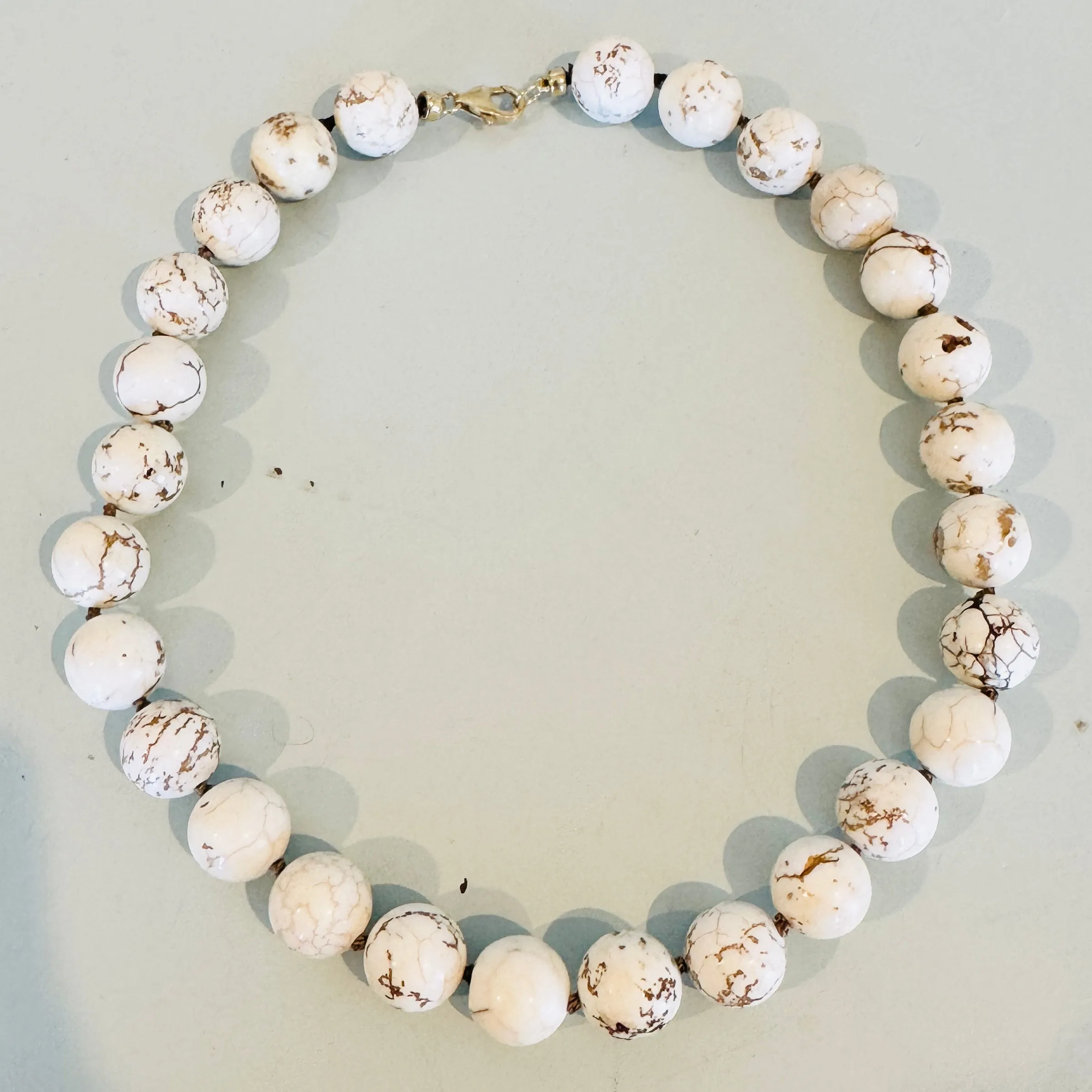 knotted gumball white howlite necklace sold by Theodosia